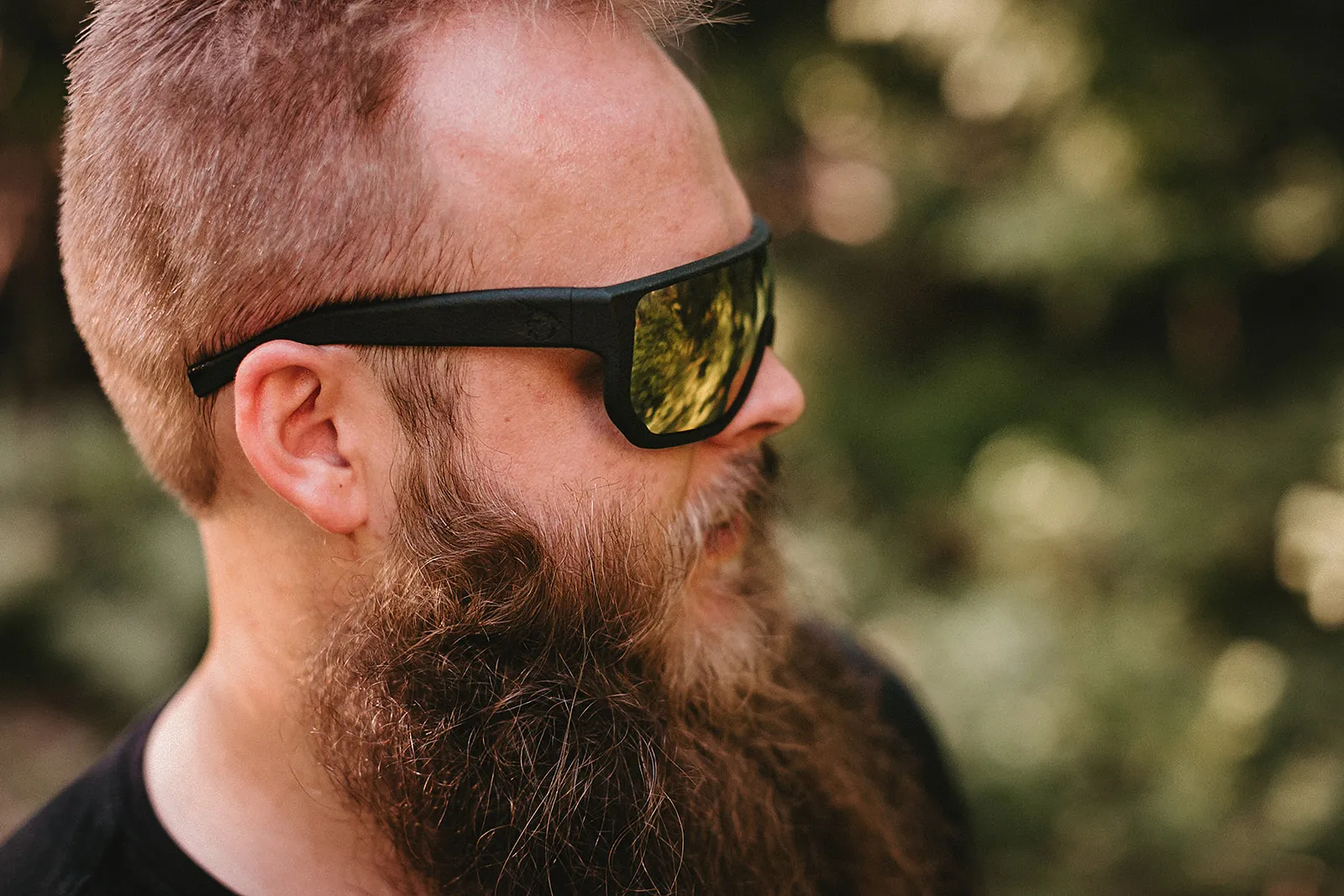 Man with saber sunglasses and beard