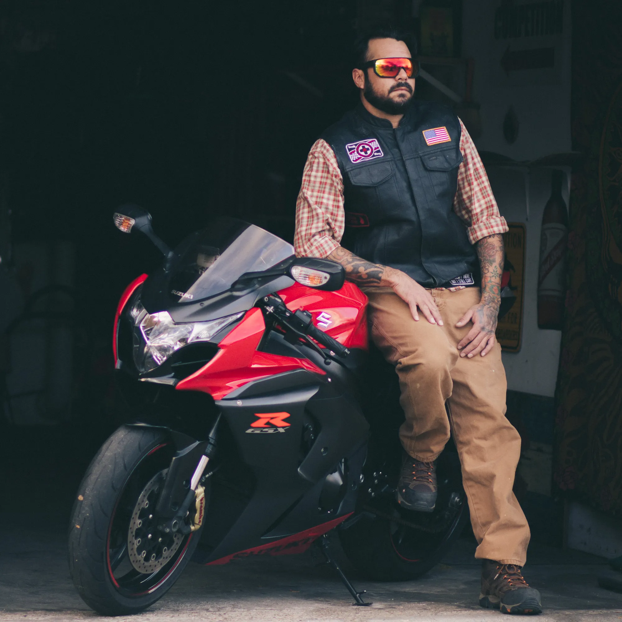Man with sunglasses sitting on a motorcycle