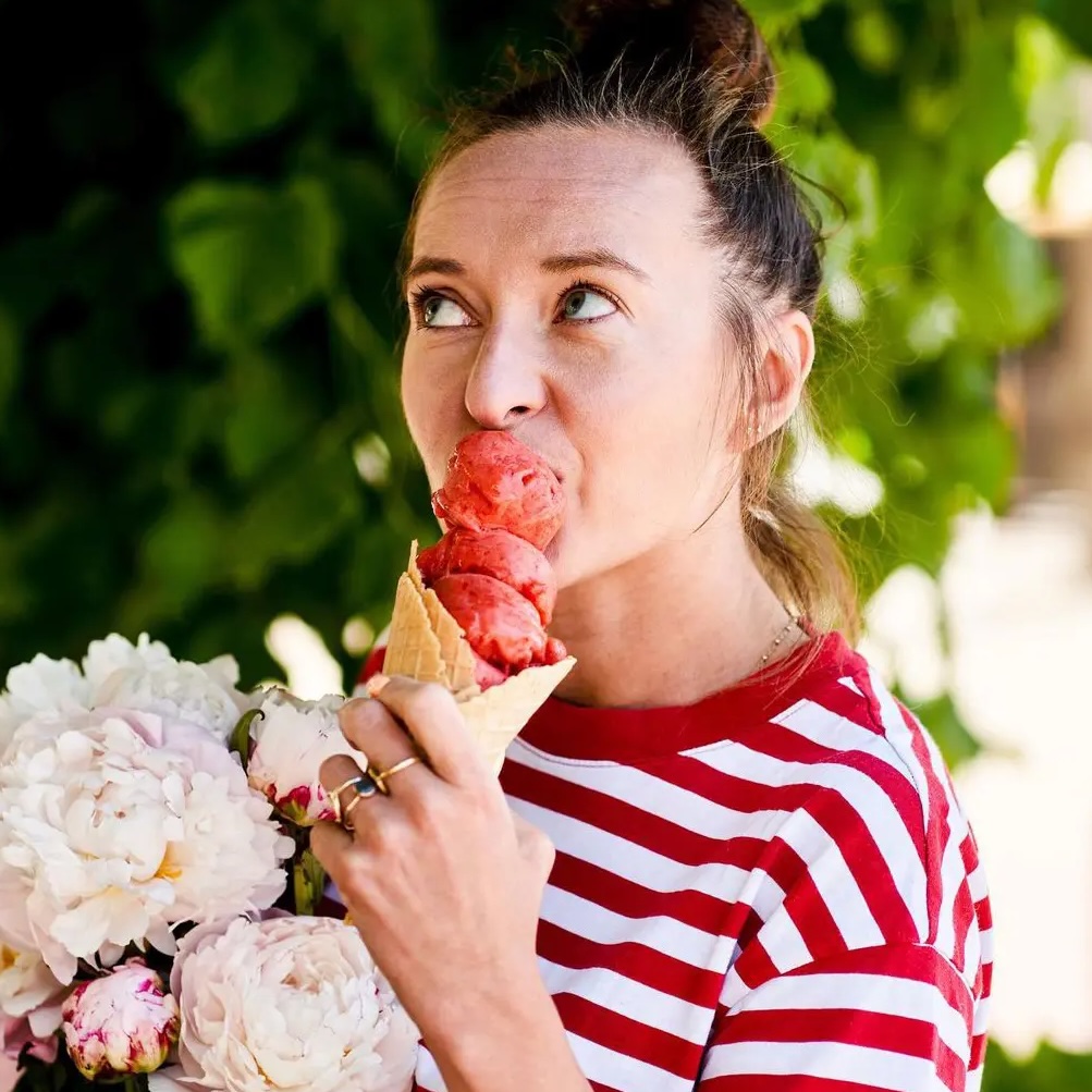 Malgosia Minta is eating ice cream.