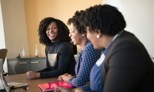 Several business women in meeting