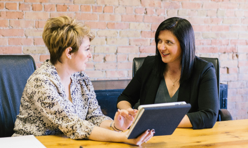 To business women talking
