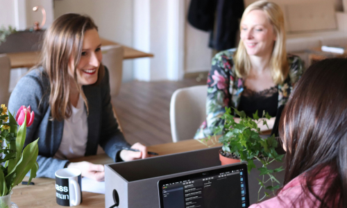 Group of female co-workers talking