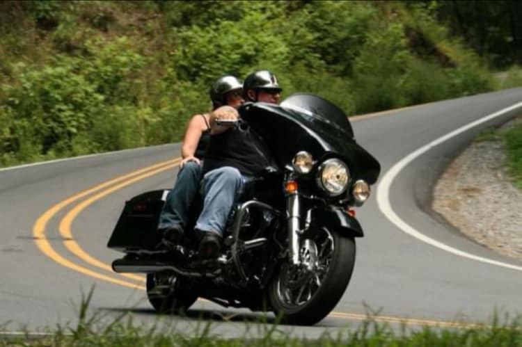 Image of Allen riding in 2006
