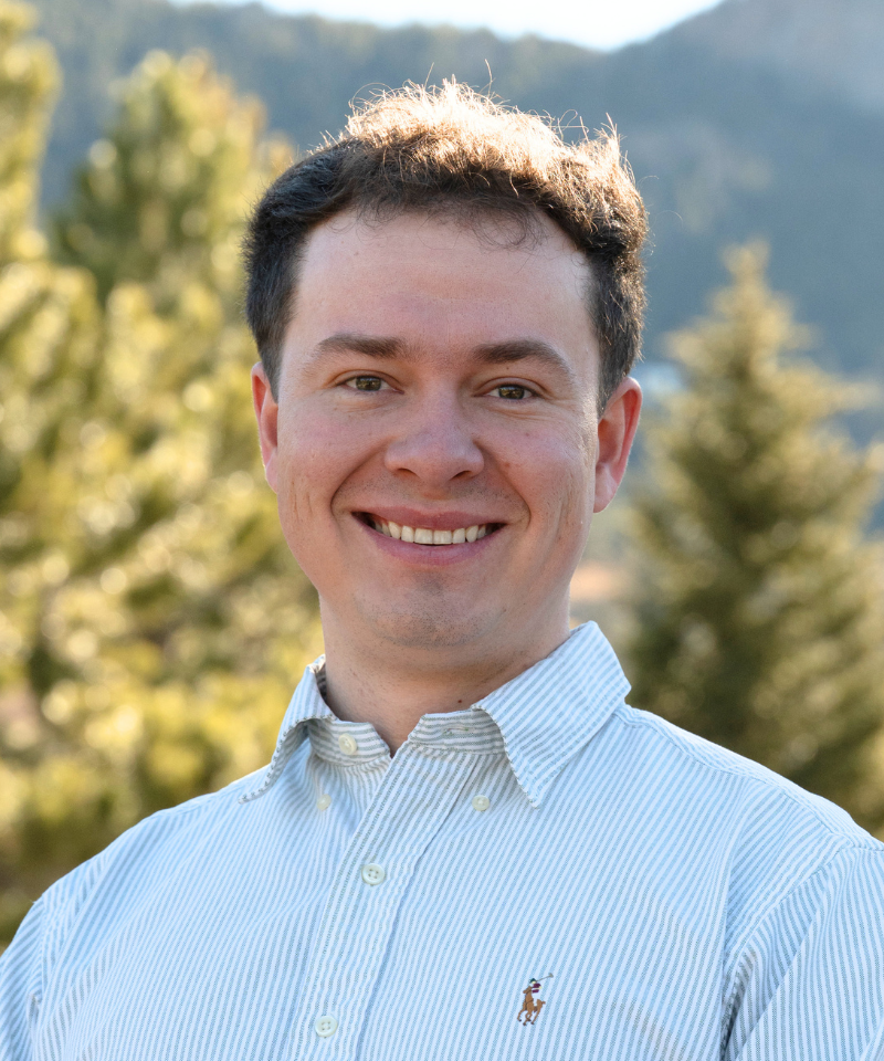 A headshot of Miles van Blarcum.