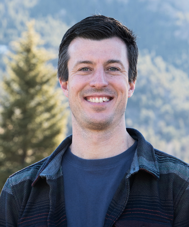 A headshot of Alden Keefe Sampson.