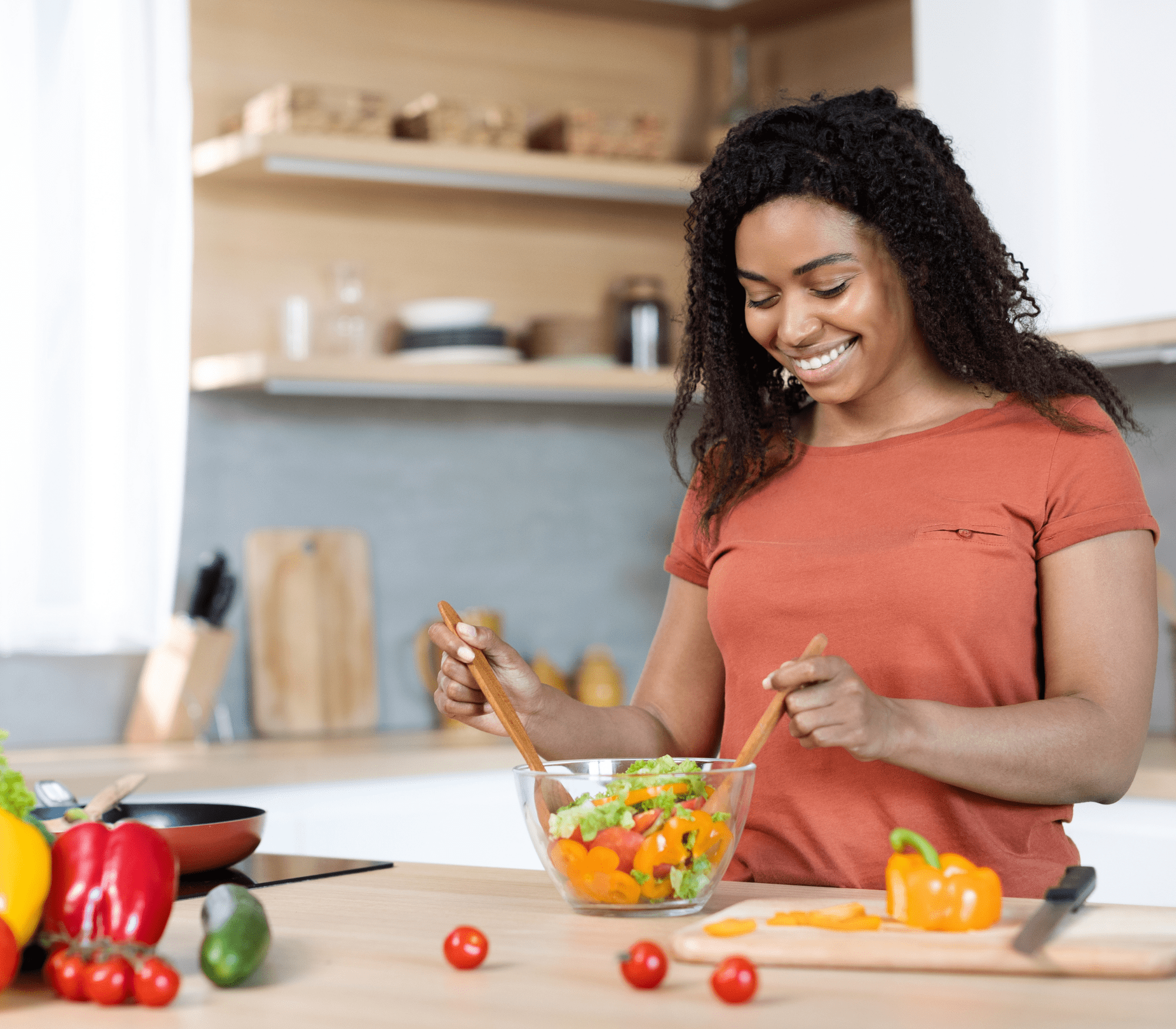 woman mixing a salad