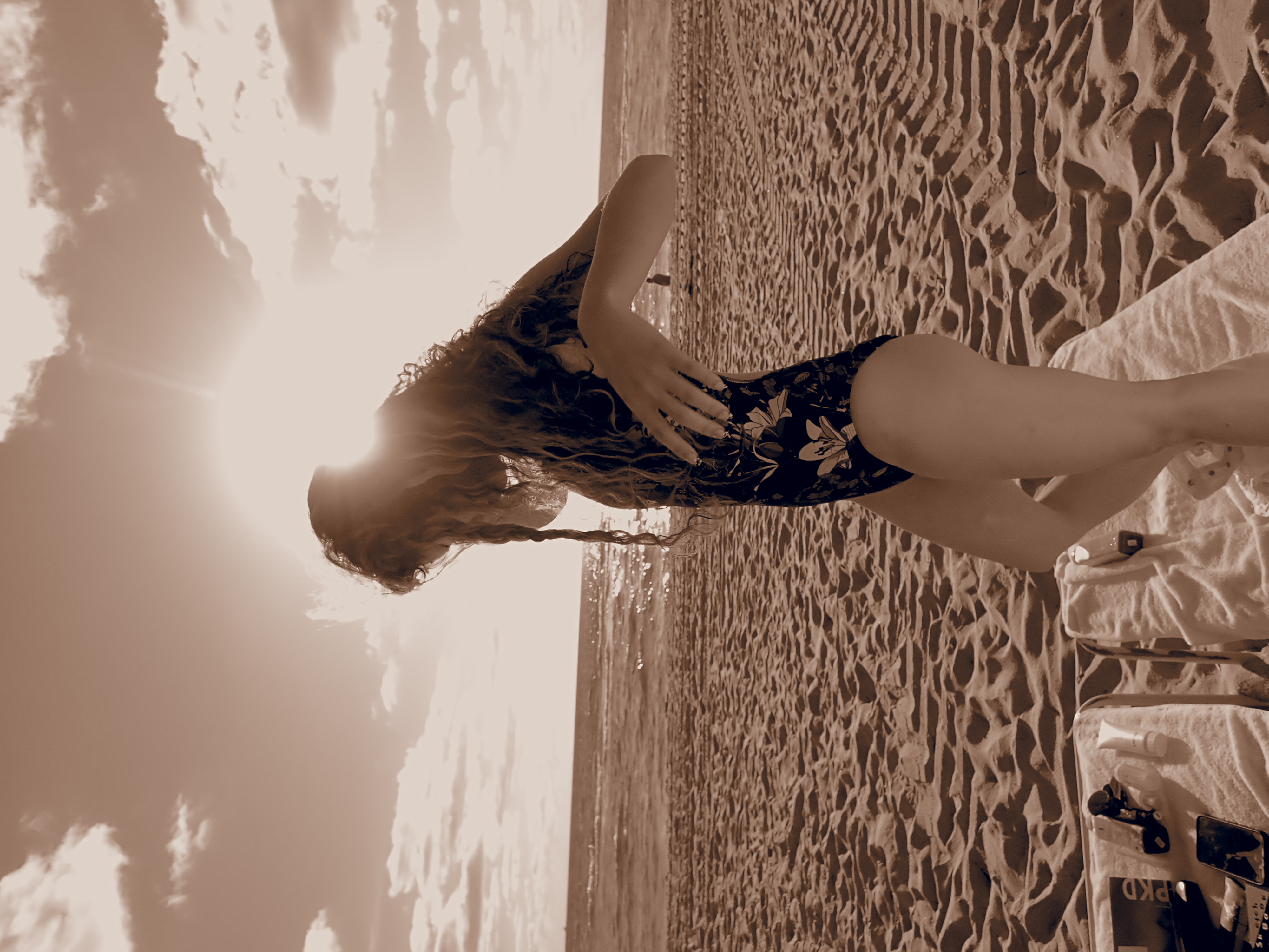 picture of mia kerin at the beach with sepia tone