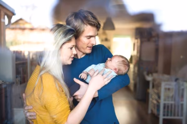 Couple with newborn baby