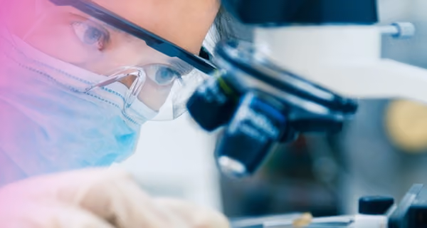 Doctor working with microscope