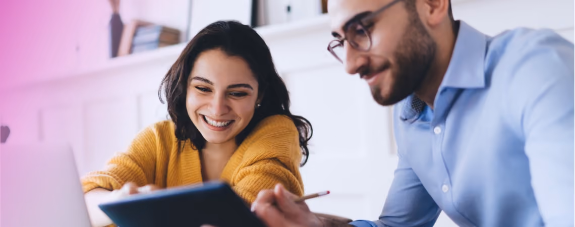 Heterosexual couple reading about fertility treatment on their computer