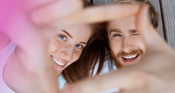 Young man and woman taking a selfie
