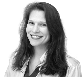 Female IVF specialist smiling
