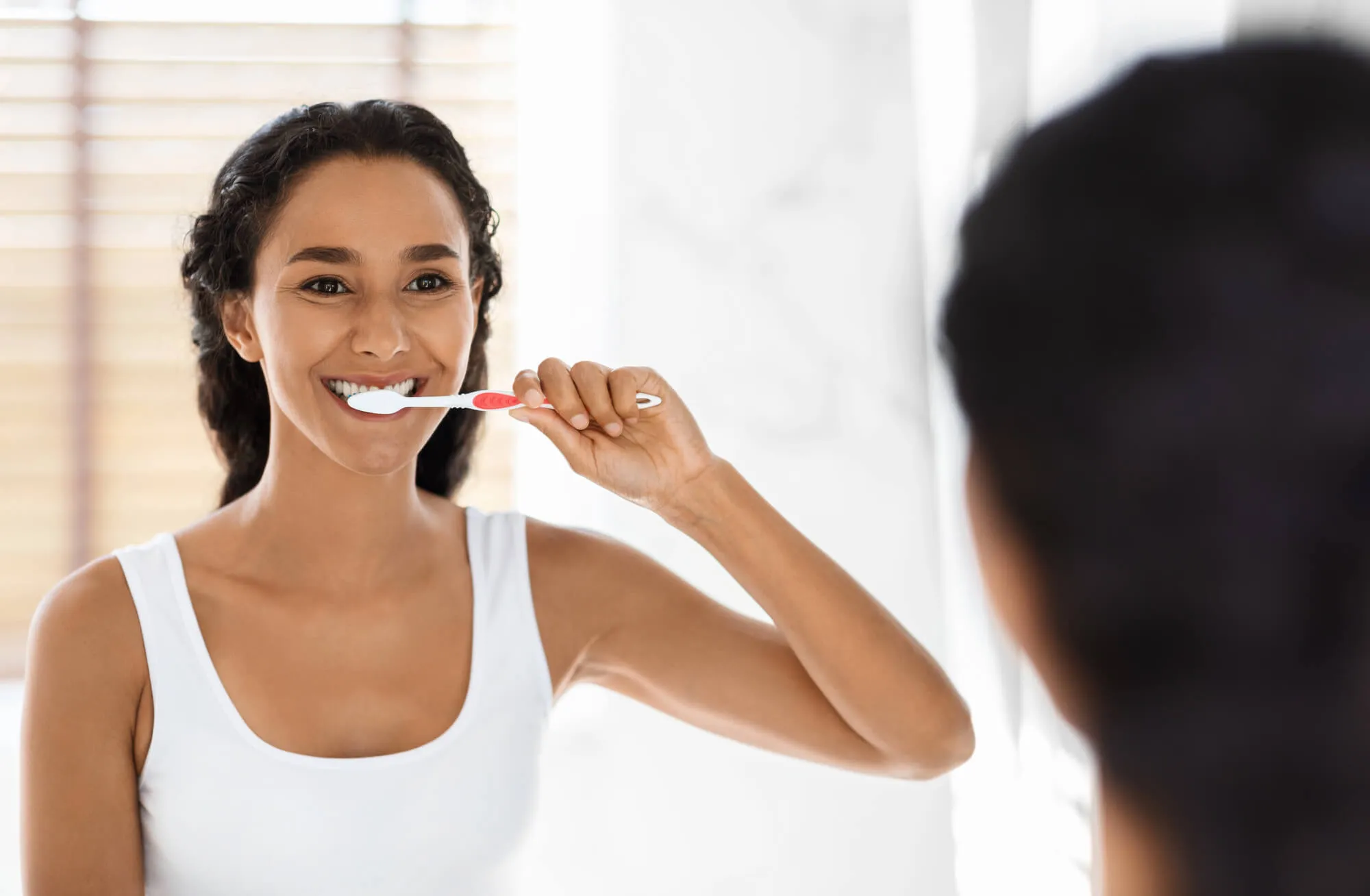 brushing teeth to protect Dental implants college station tx