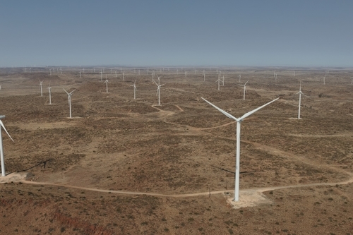 An aerial photograph of a wind turbine farm