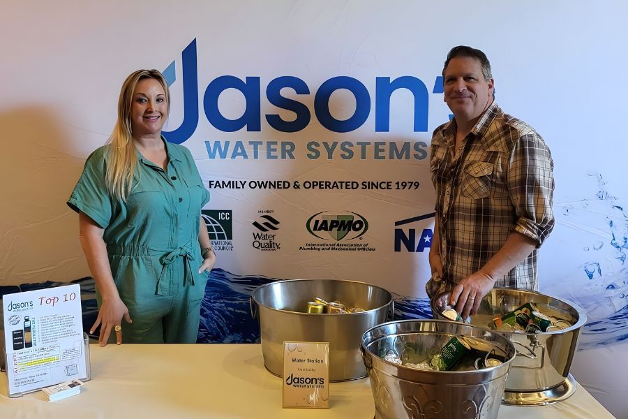 Emily Watkins and a colleague at Jason's Water Systems booth.