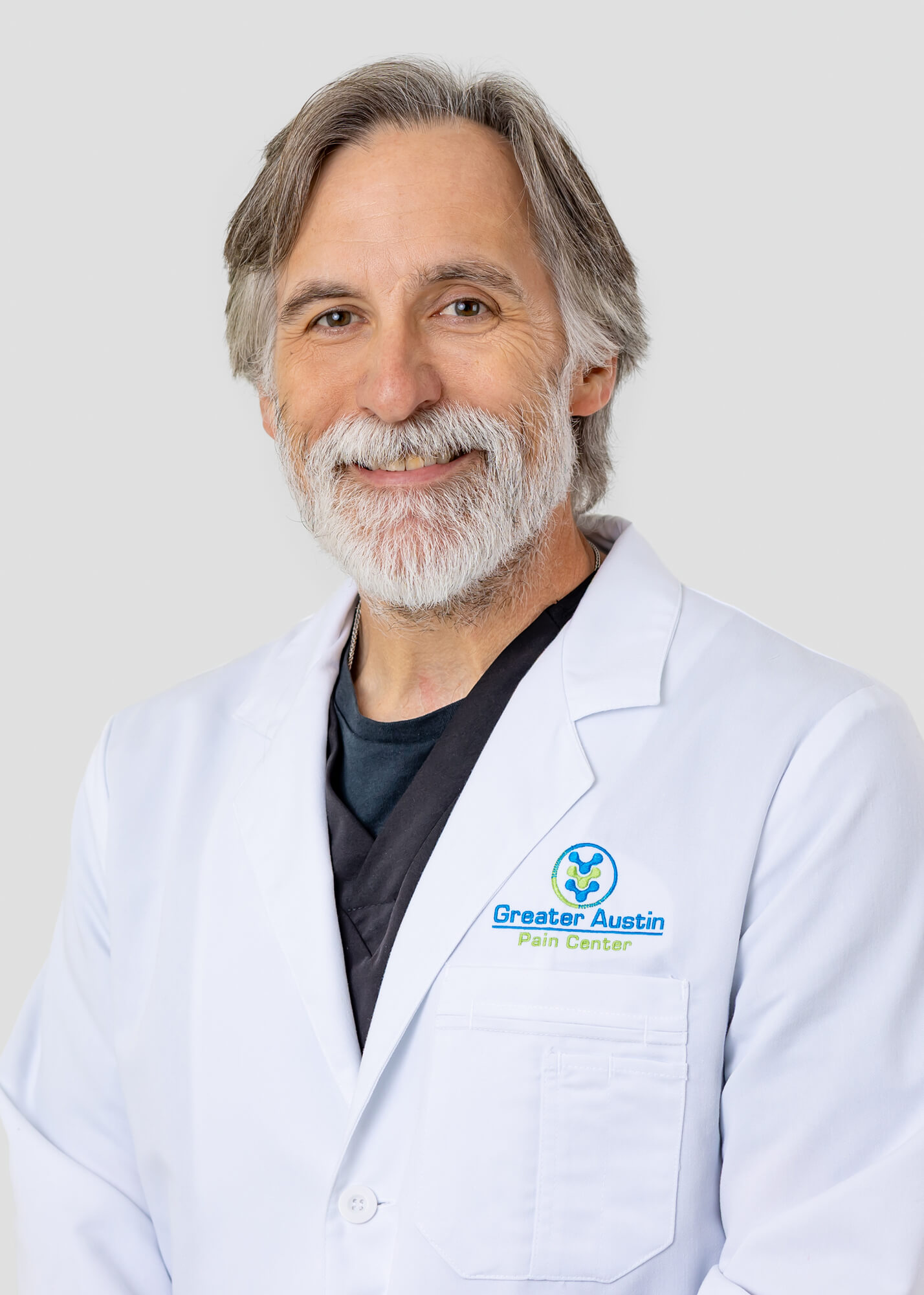 Bryant Roberson, ACNP in white coat at Greater Austin Pain Center