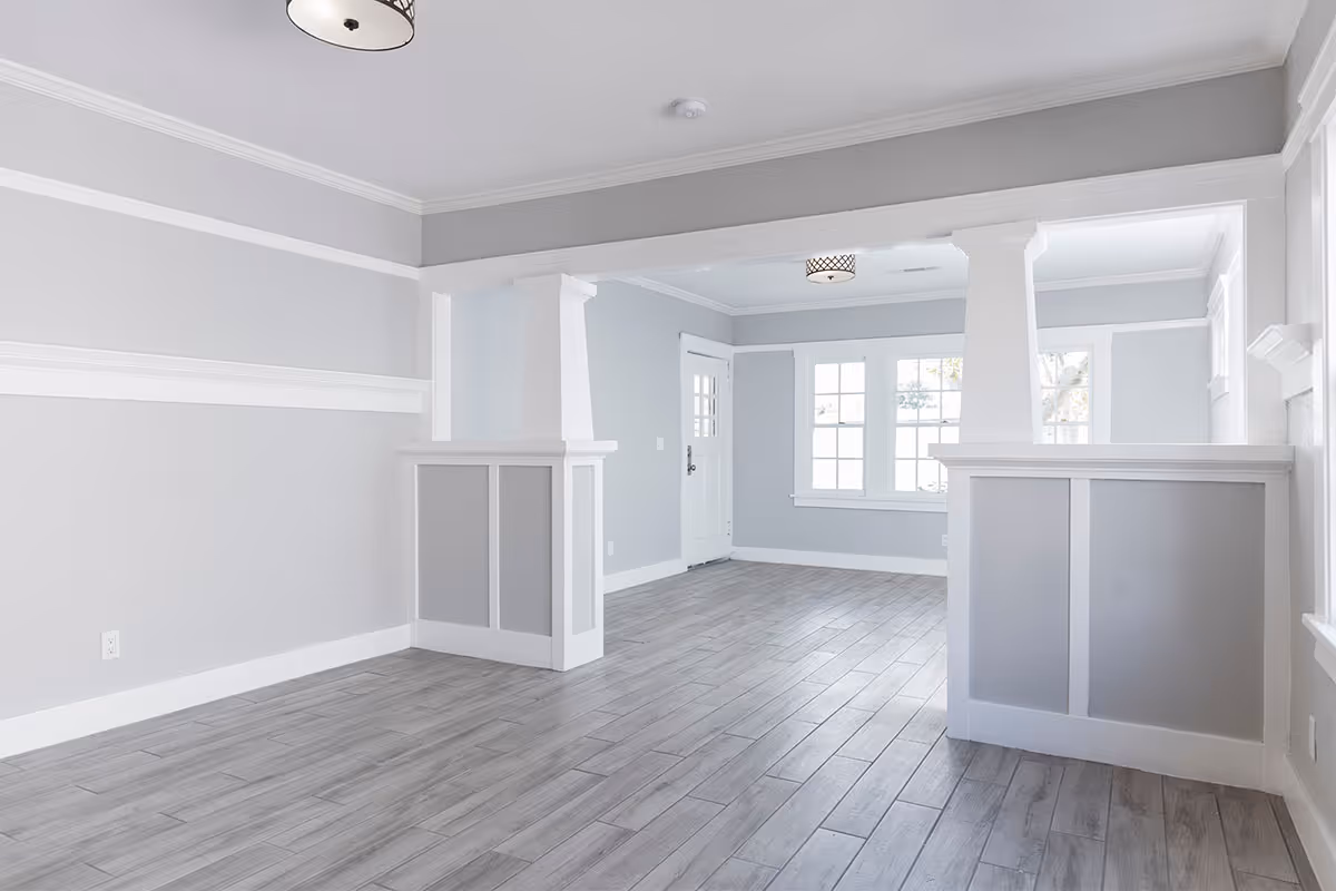 An apartment living room that has been painted neutral colours.