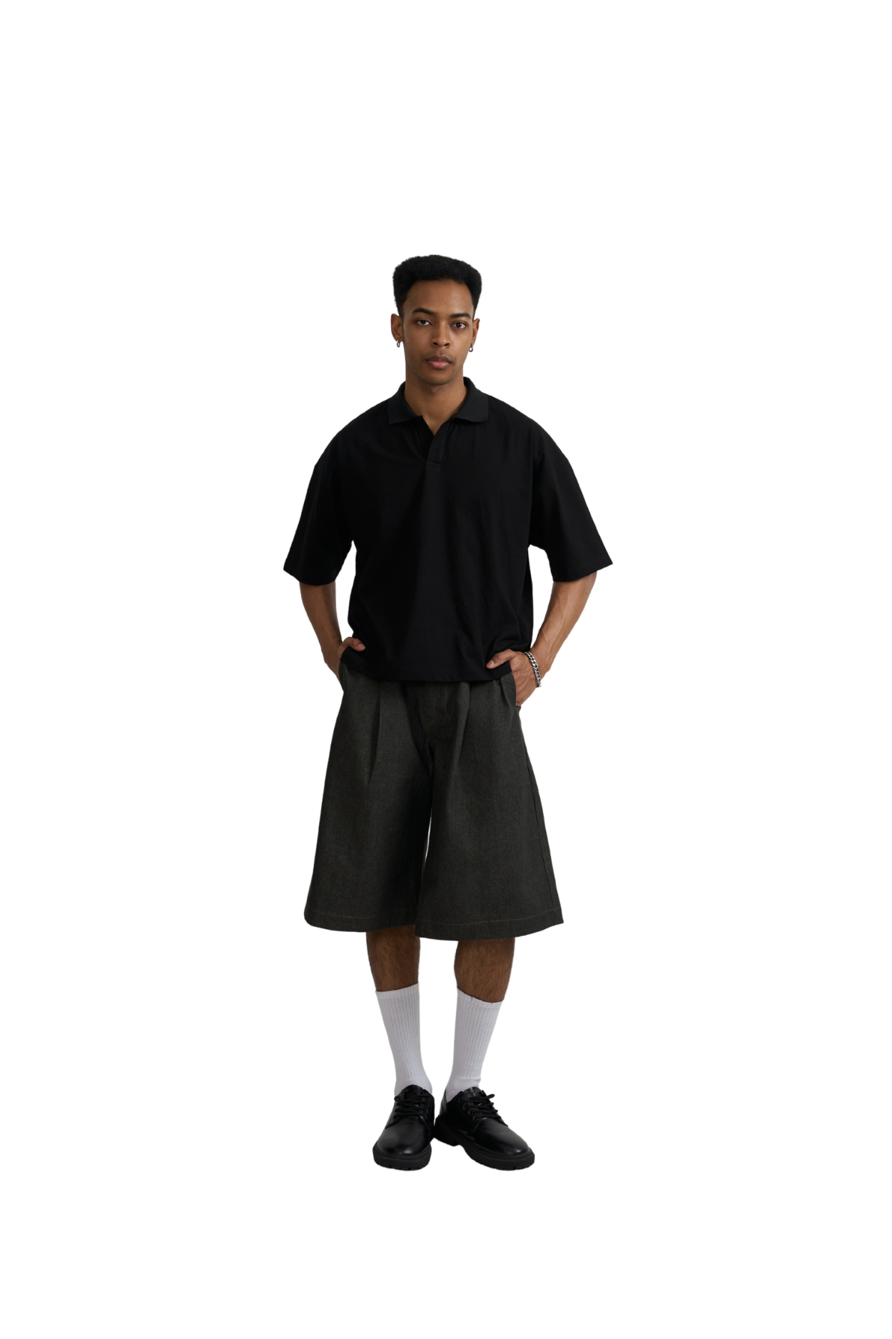 Black polo shirt worn with black shorts, full-length view