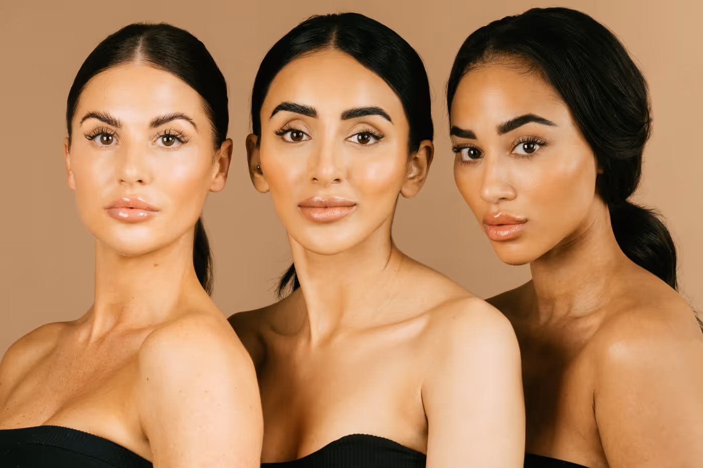 three girls sat in a row