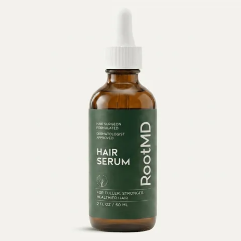Amber dropper bottle labeled RootMD Hair Serum with text stating: Hair surgeon formulated, dermatologist approved, for fuller, stronger, healthier hair, 2 fl oz / 60 ml.