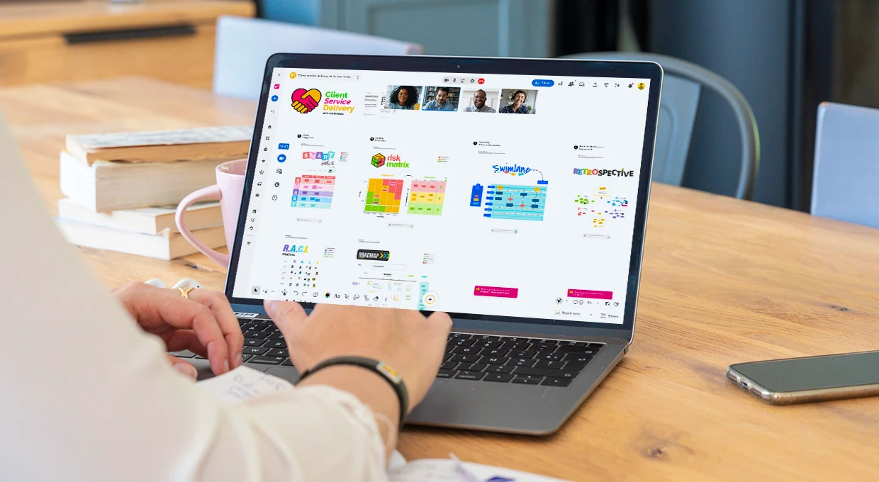 A person working on a computer with the completed "Client Service Delivery" Board and several other people connected via video. | Klaxoon