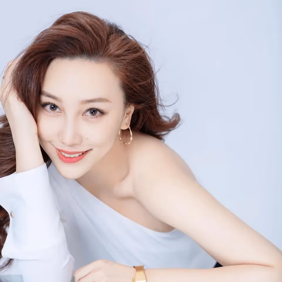 Erica Wenmeng Gu