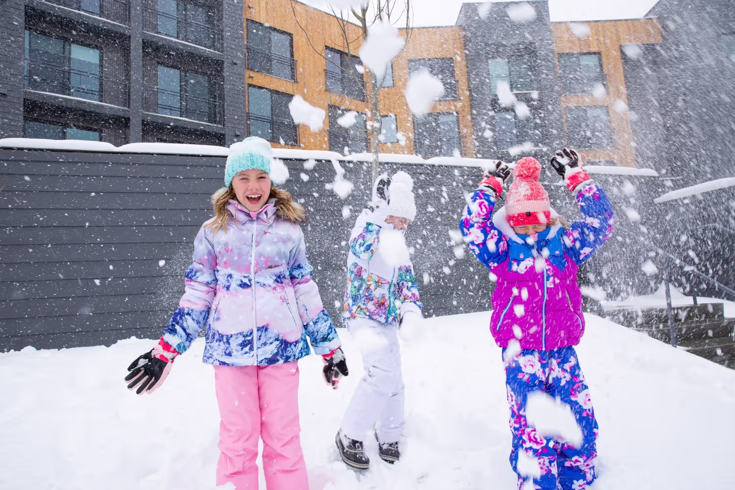 kids playing in the snow