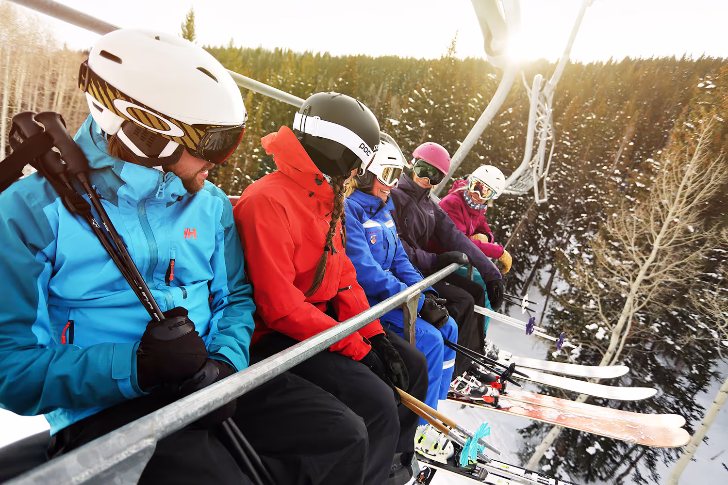 five skiers on the ski lift
