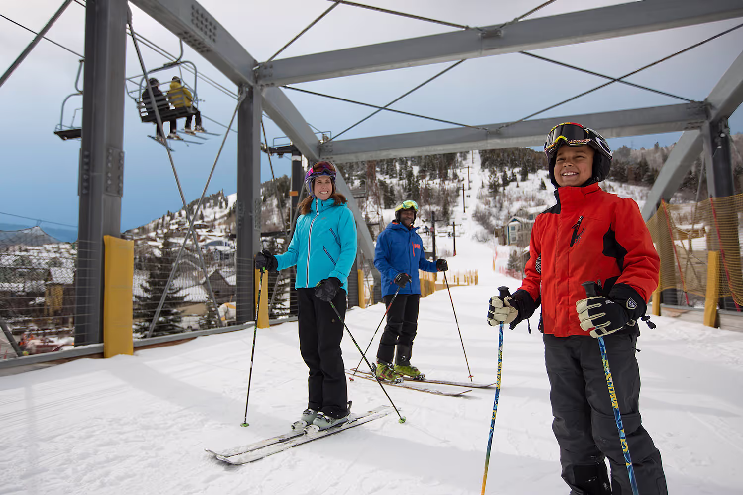 skiers standing and smiling