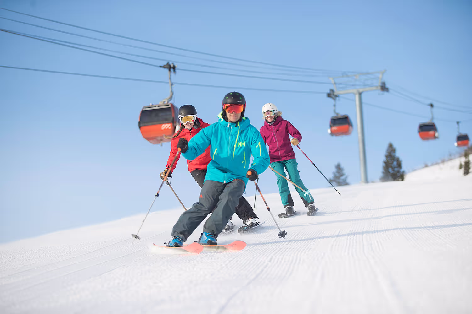 skiers coming down the mountain