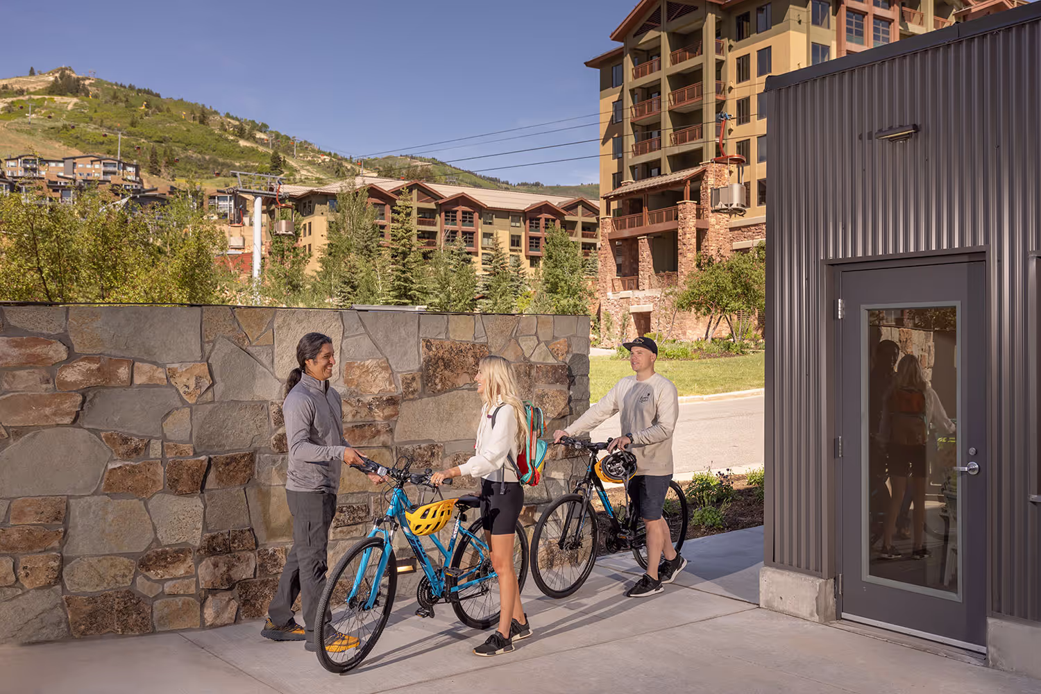 Man and woman talking to bike valet.