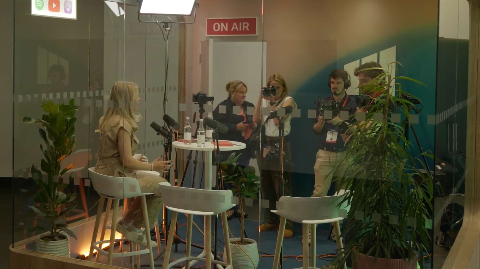 On-location production team recording videos at an event for a show.
