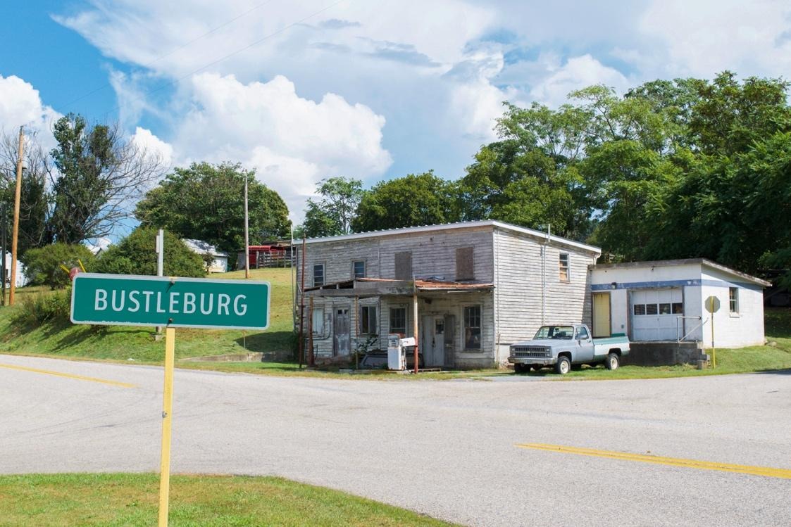 A street sign next to a buildingAI-generated content may be incorrect.