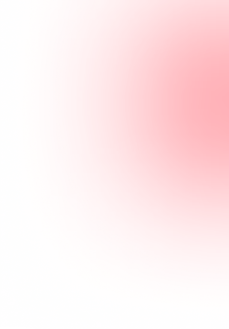 Close-up of a bright red circle with a textured gradient fading into a speckled black and white background.