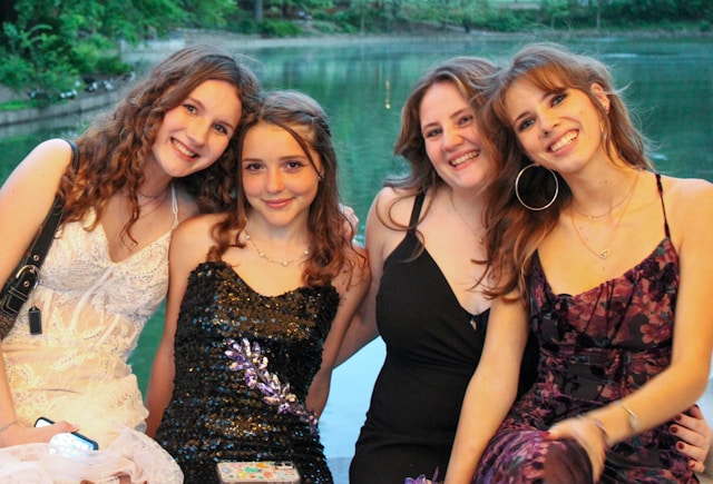a group of young women standing next to each other