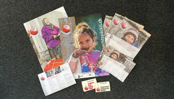 Infomaterial Aktion Weihnachtspäckli
