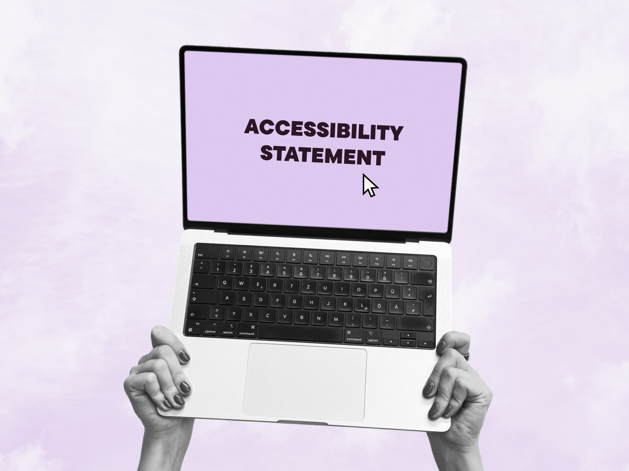 Two hands hold a laptop in the air with the word “Accessibility Statement” on it
