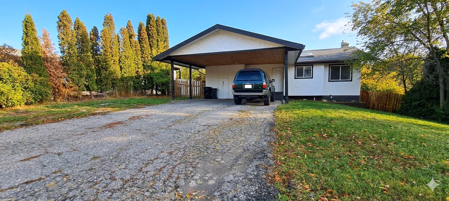 Cracked asphalt driveway in Vernon