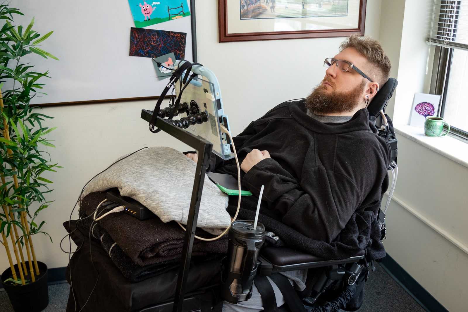 Nathan in chair watching device