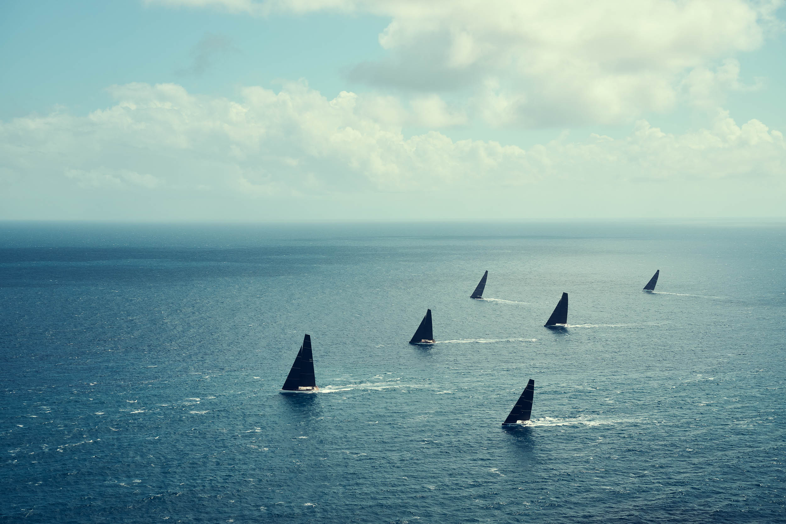 Sailing yachts crossing open water int he caribbean
