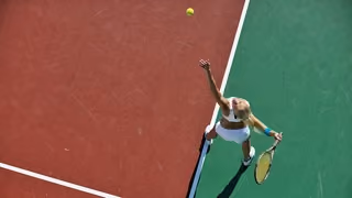 Sports channel - a tennis player on an outdoor court