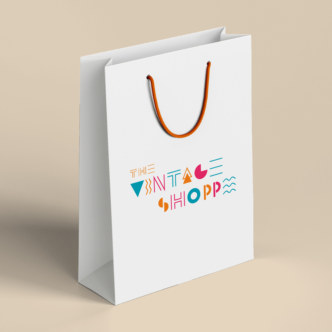 The Vintage Shoppe logo mockup. shopping bag