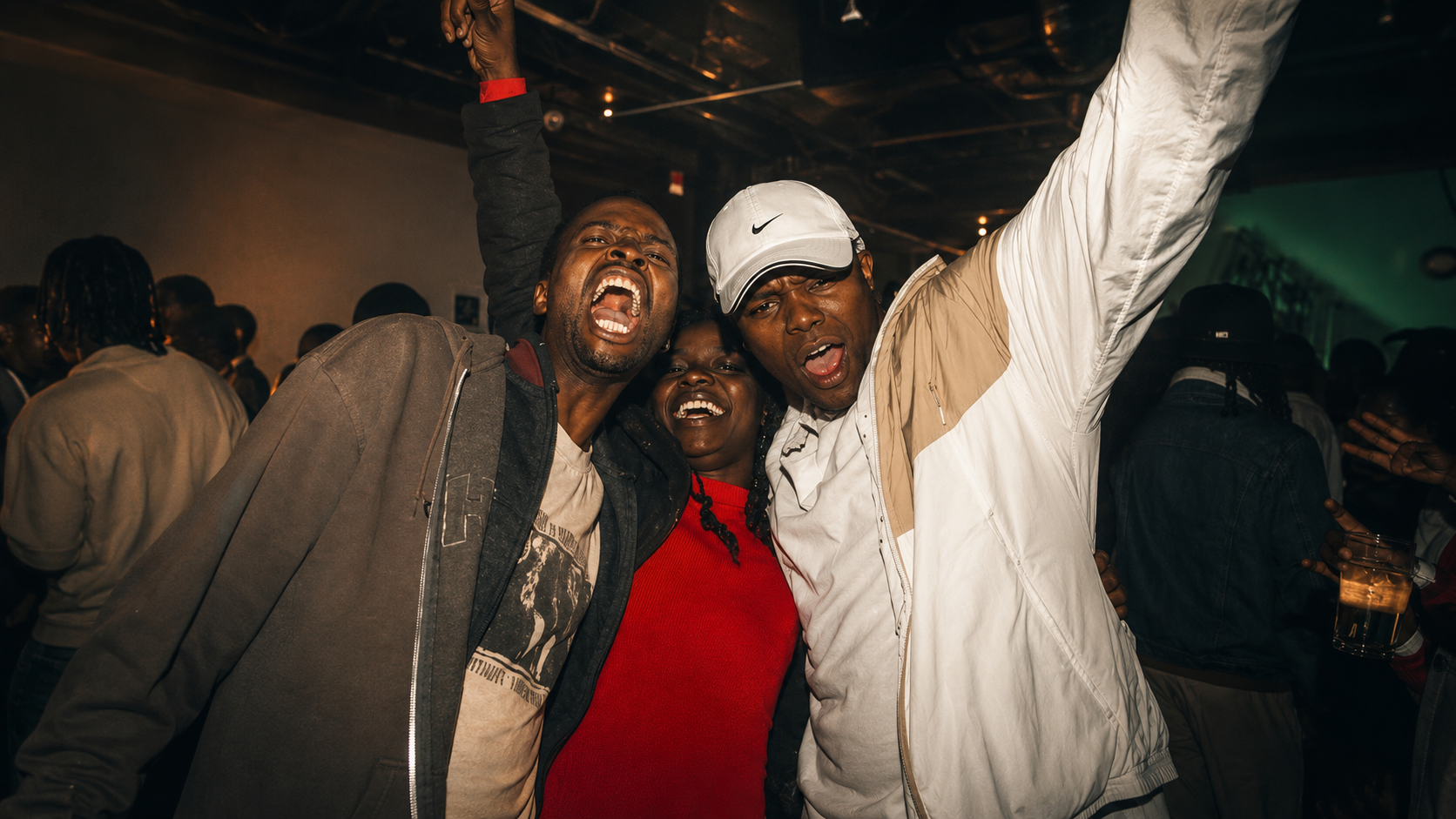 Pure celebration — guests throw their hands up inside the Nike X MTV Air Force 1 25th anniversary party in Johannesburg, capturing the joy, freedom and cultural energy that defined an unforgettable night. ©Jandré Louw