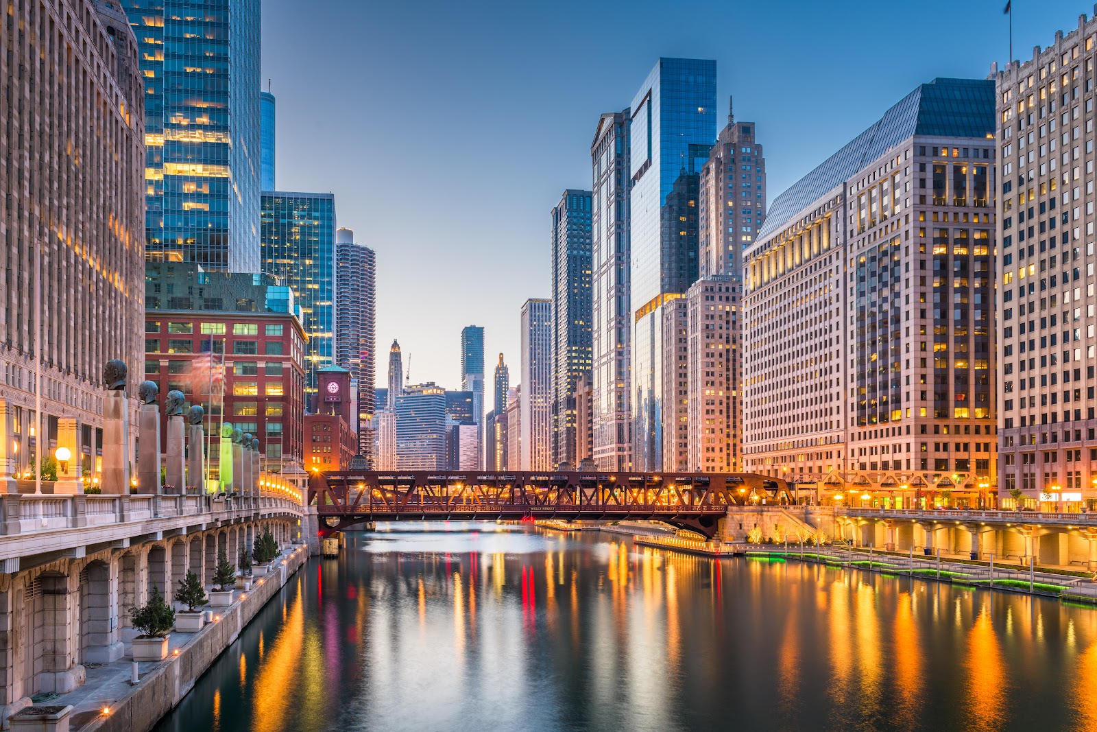 Chicago Illinois cityscape on the river at twilight - construction noise barrier solutions