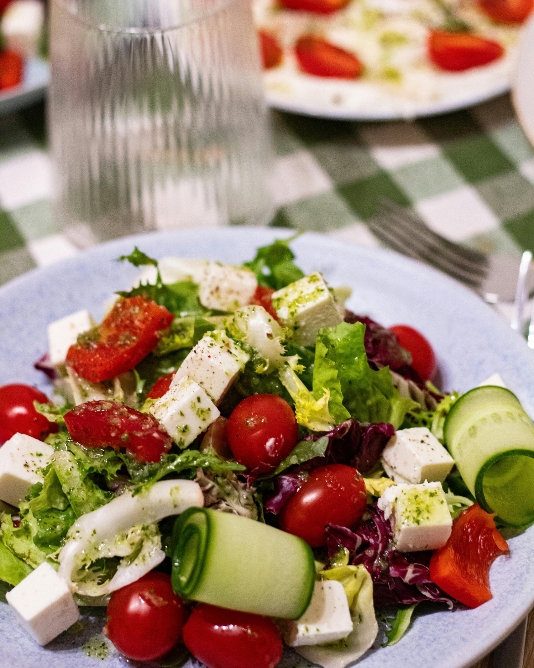 Takinoa swiss-style greek salad with swiss cheese tomato cucumber