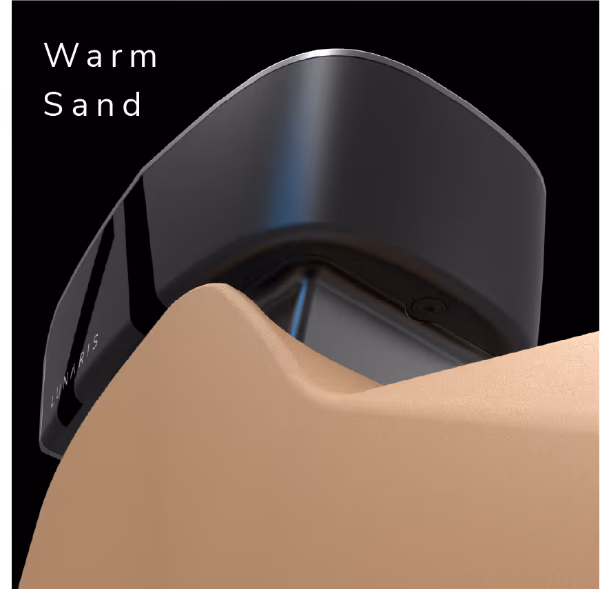 Close-up of a sleek black product part labeled 'Lunaris' with text 'Warm Sand" on a black background.