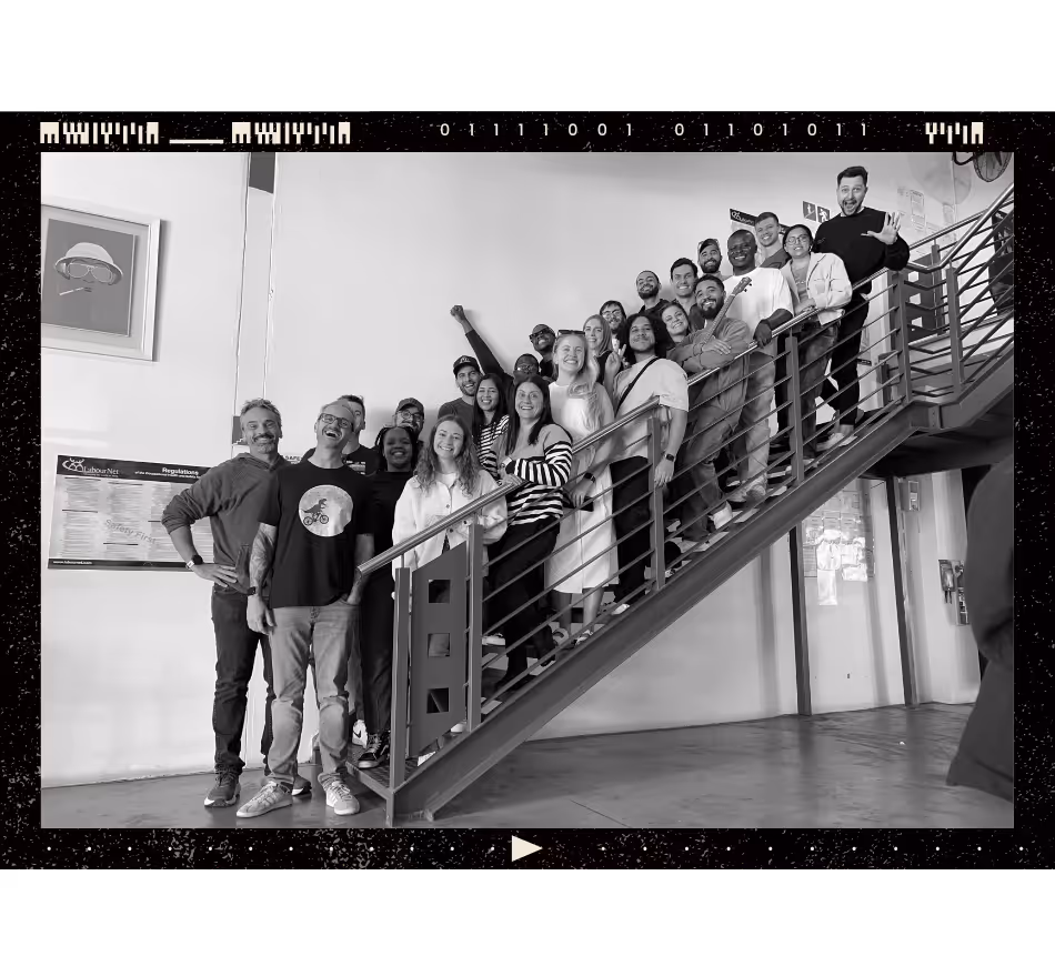 YOUKNOW Team of Experts standing on a staircase