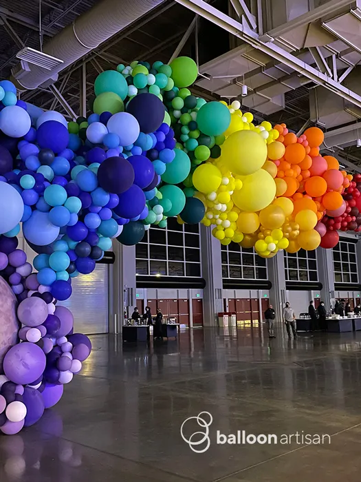 A large rainbow balloon arch created by a balloon company in Phoenix, Arizona.