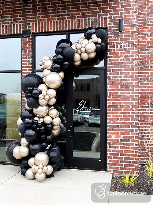 A building decorated with a balloon garland arch for a company customer appreciation grand opening event makes the perfect balloon decoration.