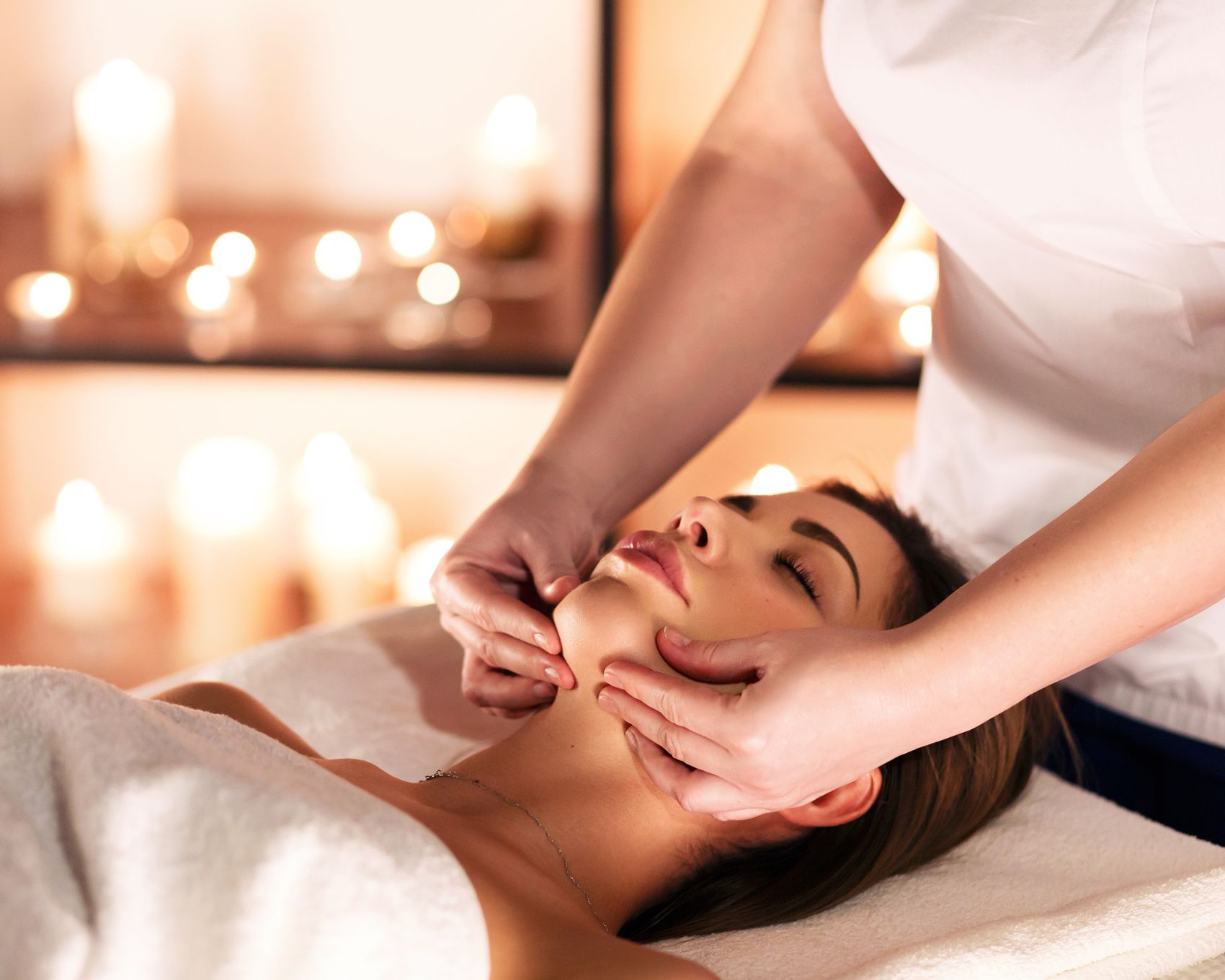 Guest receiving a facial massage in the Ocean Reef Club spa
